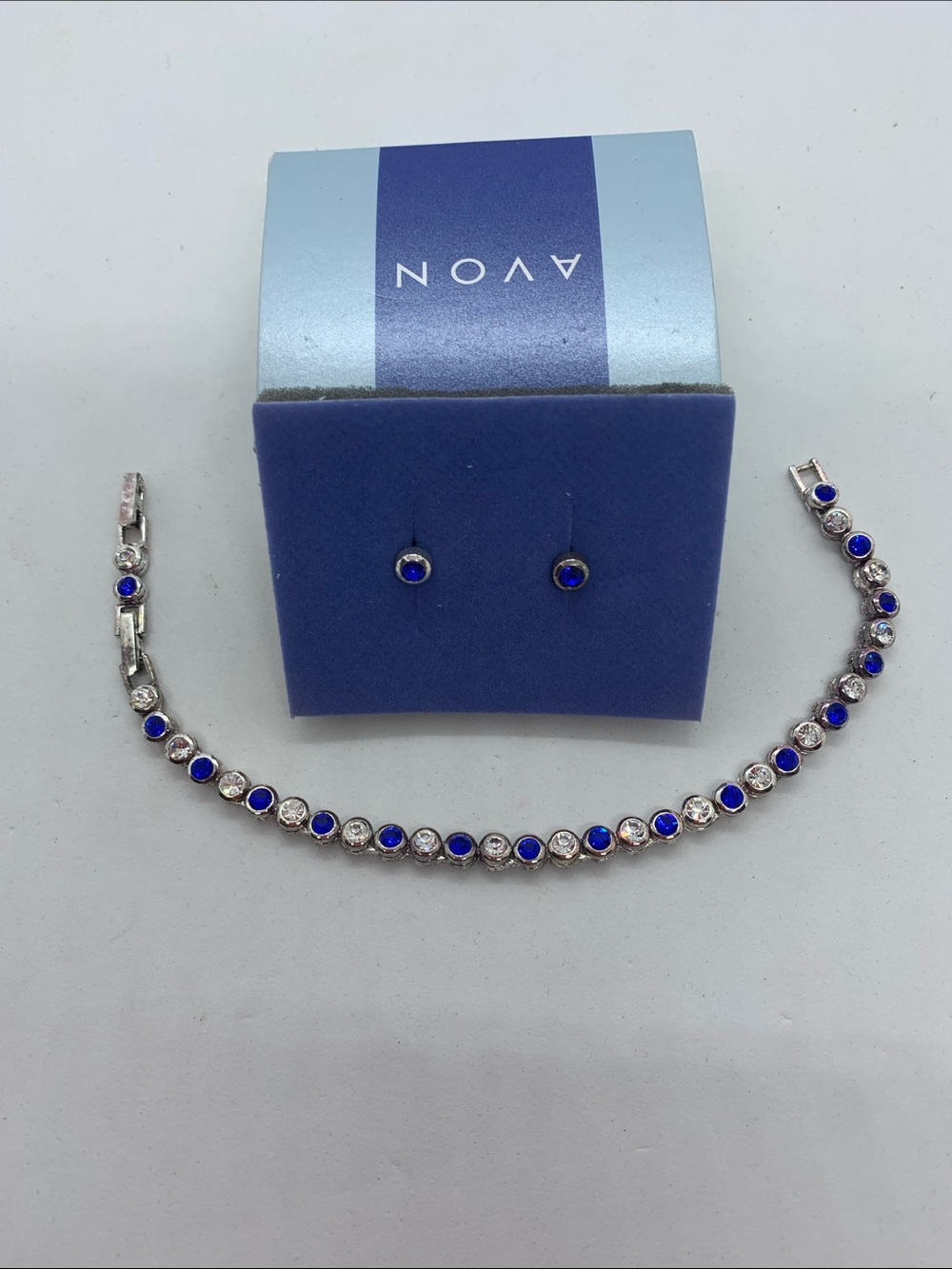 AVON Sparkling Silvertone Crystal Tennis Bracelet & Earrings with Blue Stones